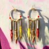 Boucles d'oreilles rondes plumes de calligraphie rouge Graffiti