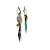Boucles d'oreilles asymétriques plumes de calligraphie turquoise Graffiti