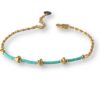 Bracelet écrous laiton et perles Miyuki turquoise : bracelet en laiton avec écrous et perles turquoise sur chaîne billes.
