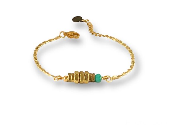 Bracelet écrous doré Oh la la ! perle turquoise : bracelet en laiton doré avec écrous et perle turquoise.