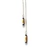 Collier de créateur avec perles noires et chaines en laiton doré à l'or fin.